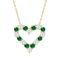 LADIES PENDANT WITH CHAIN 0.65CT ROUND/EMERALD DIAMOND 14K YELLOW GOLD (CENTER STONE EMERALD APPROX- 0.25CT)